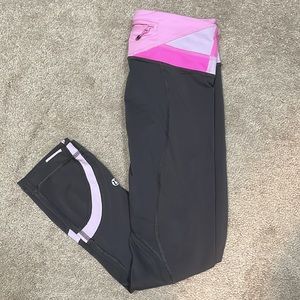Size 2 charcoal Lululemon crops with mesh on calf and back zipper.